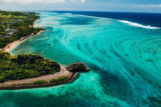 Maconde view point.Monument to captain Matthew Flinders in Mauritius. An unusual road to the Islands of Mauritius. Coral reef in the Indian ocean.