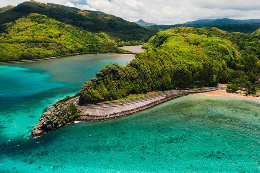 Maconde view point.Monument to captain Matthew Flinders in Mauritius. An unusual road to the Islands of Mauritius. Coral reef in the Indian ocean.