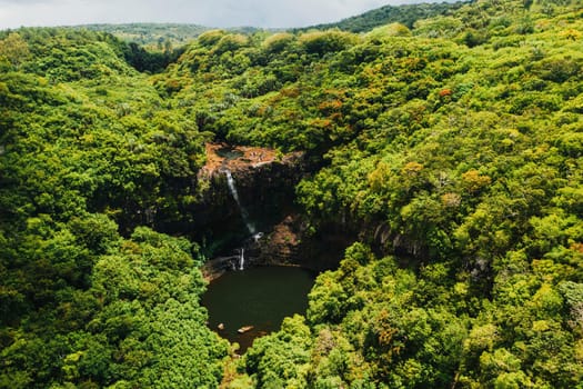 Aerial view from above of the Tamarin waterfall seven cascades in the tropical jungles of the island of Mauritius.