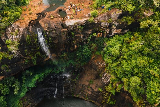 Aerial view from above of the Tamarin waterfall seven cascades in the tropical jungles of the island of Mauritius.