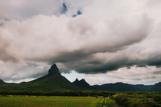 Aerial view of mountains and fields in Mauritius island.