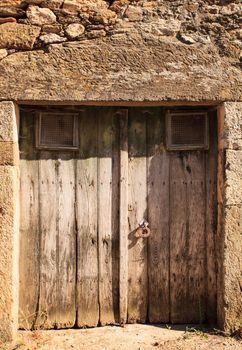 View of old door of a rural house