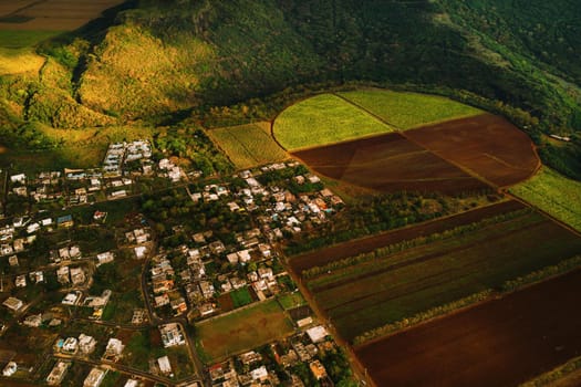 Bird's eye view of beautiful fields Islands of Mauritius and mountains.