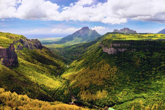 Mountain Landscape of the gorge on the island of Mauritius, Green mountains of the jungle of Mauritius.