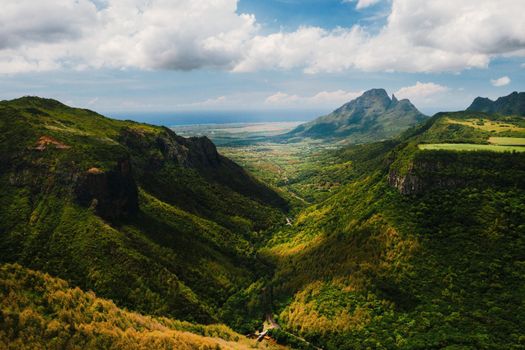 Mountain Landscape of the gorge on the island of Mauritius, Green mountains of the jungle of Mauritius.