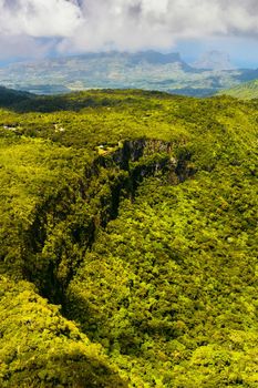 Bird's-eye view of the mountains and fields of the island of Mauritius.Landscapes Of Mauritius