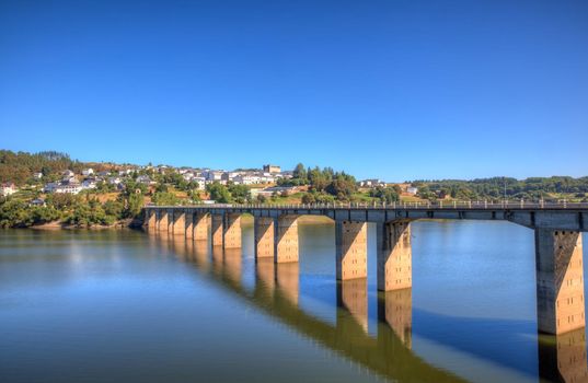 Roman bridge over the Minho River in Portomarin, Spain