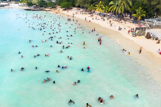 December 8, 2019. island of Mauritius, Locals relax on weekends and swim in the Indian Ocean.