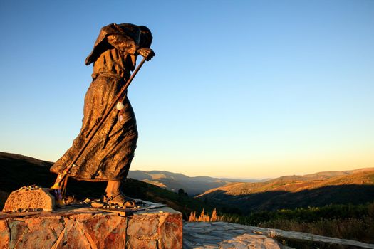 Alto de San Roque, Spain - August, 10: The monument to the pilgrim of the Alto de San Roque, it's a famous bronze statue of a pilgrim facing towards Santiago, work of the Galician sculptor José María Acuña on August 10, 2016
