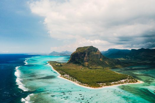 A bird's-eye view of Le Morne Brabant, a UNESCO world heritage site.Coral reef of the island of Mauritius.Storm cloud.