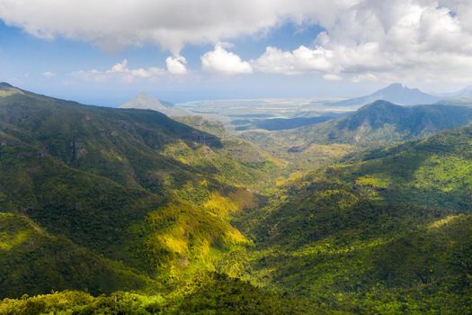 Bird's-eye view of the mountains and fields of the island of Mauritius.Landscapes Of Mauritius
