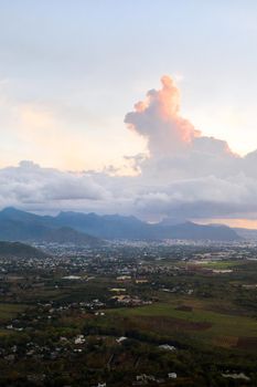 Top view of the sunset city and mountains on the island of Mauritius, Mauritius Island.