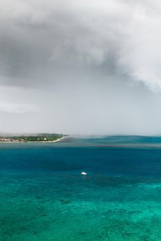 A thunderstorm approaching the coast of the island of Mauritius in the Indian Ocean.