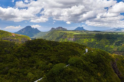 Mountain Landscape of the gorge on the island of Mauritius, Green mountains of the jungle of Mauritius.