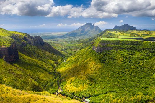 Mountain Landscape of the gorge on the island of Mauritius, Green mountains of the jungle of Mauritius.