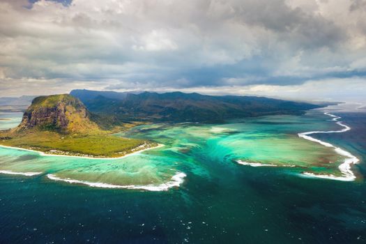 A bird's-eye view of Le Morne Brabant, a UNESCO world heritage site.Coral reef of the island of Mauritius.Storm cloud.