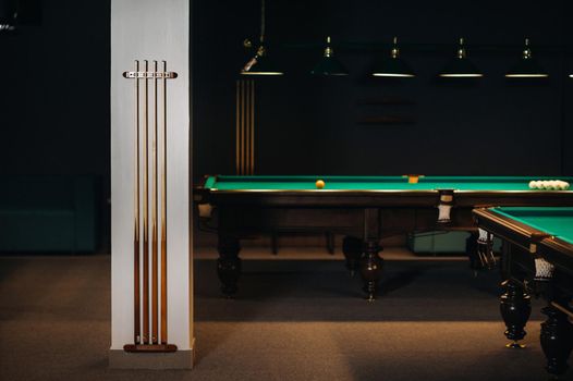 Billiard cue in the game club.Billiard club.