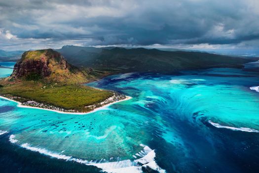 A bird's-eye view of Le Morne Brabant, a UNESCO world heritage site.Coral reef of the island of Mauritius.Storm cloud.