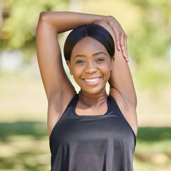 Black woman portrait, fitness and stretching arms in nature park for healthcare wellness, relax exercise or workout sports training. Smile, happy athlete and warm up for muscle pain relief in garden.