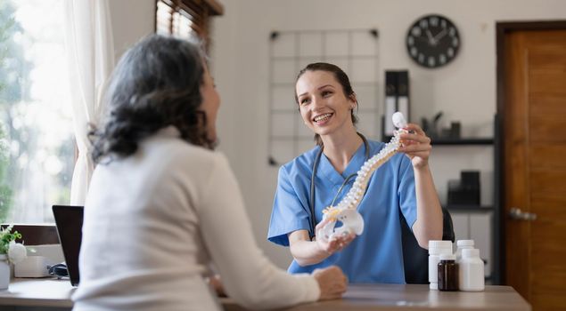 Doctor explain about back bone issue to fat woman patient. Health care and healthy lifestyle concept...