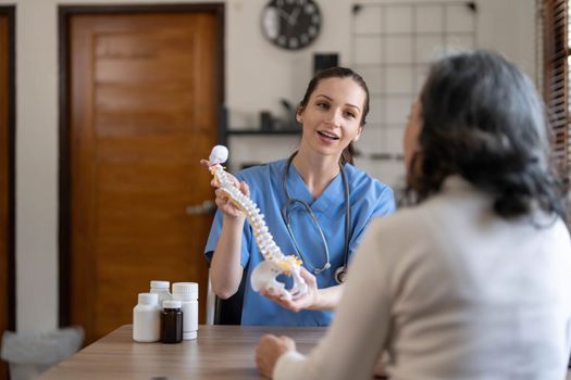 Doctor explain about back bone issue to fat woman patient. Health care and healthy lifestyle concept...