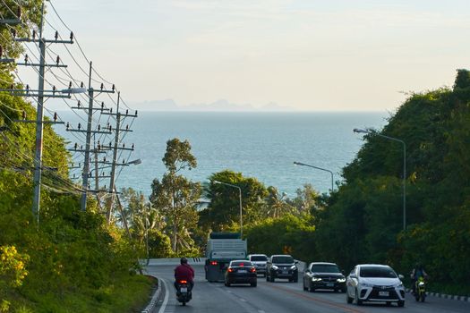Traffic in Thailand on the island of Samui. Normal life on the island. Koh Samui, Thailand - 09.15.2022