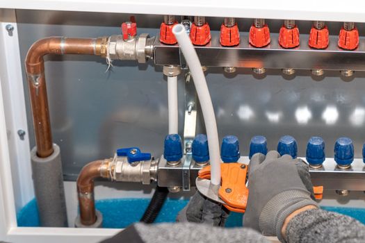 connecting the floor heating to the switchboard.