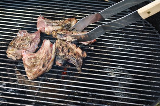 Ribs of lamb on grill. BBQ barbecue