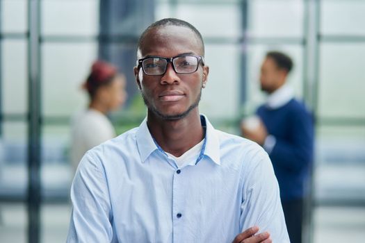 African American business man with folded arms