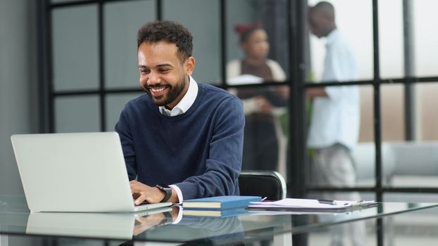 businessman working on a laptop in an office