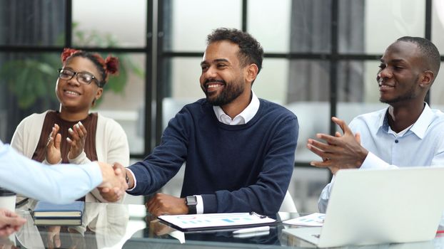 African american business team talking about strategy