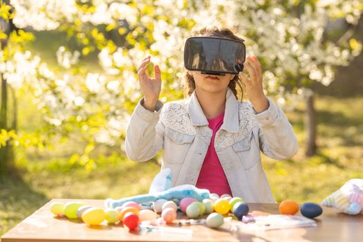 teenage girl with easter egg in virtual glasses.