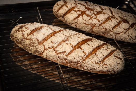 Rye bread on brown background. High quality photo