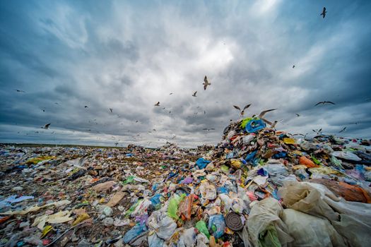 Large landfill near the metropolis in autumn