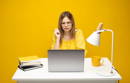 Stressed angry business woman having problem with laptop. Frustrated woman fed up with bad news online or virus from internet, critical fatal error, all data loss