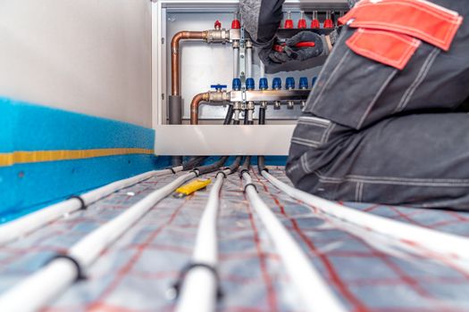 connecting the floor heating to the switchboard.