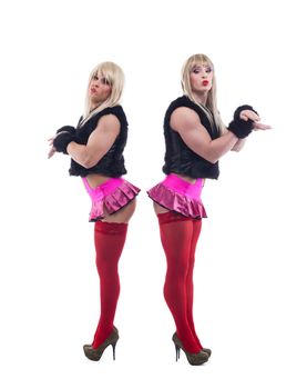 Full length portrait of two transvestites in white go-go wigs. Isolated on white