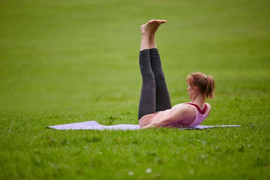 The perfect yoga studio. a woman doing yoga in the park