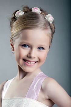 Studio portrait of happy and beautiful little girl