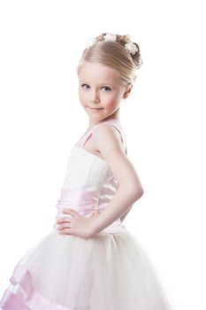 Portrait of little girl in beautiful dress. Isolated on white