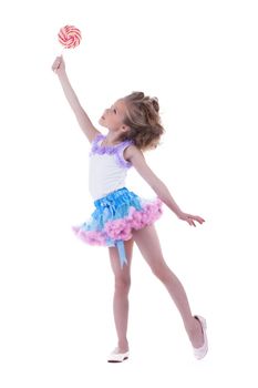 Pretty young girl with candy, isolated on white