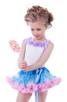 Pretty little girl with lollipop. Isolated on white