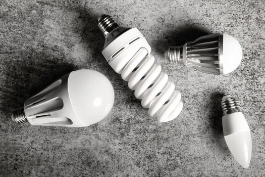 Top view on some electric lamps with different technology - different led, luminescent.