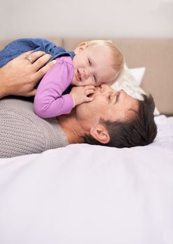 They share such a special bond. A baby girl lying down on her fatheramp039s chest