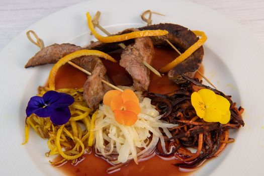 Recipe for duck aiguillettes with three-coloured turnips and orange caramel port sauce, High quality photo