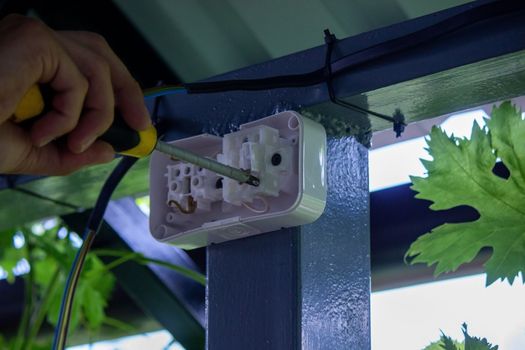 electrician to connect the outlet. selective focus
