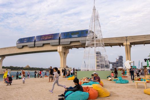 Construction site, new modern buildings, bridge with monorail, fast development in Dubai