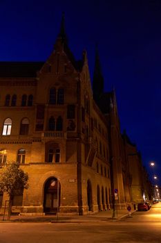 A nighttime street in the center of Budapest. Budapest, Hungary - 08.24.2022