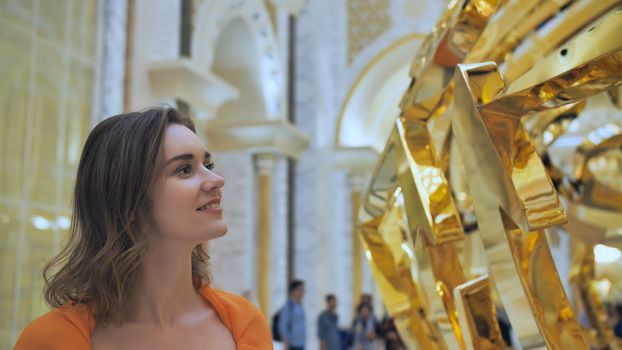 The girl enjoys beautiful scenery at the Presidential Palace in Abu Dhabi