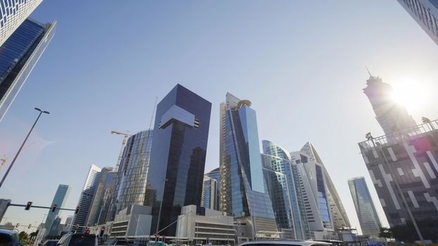 Tall and modern skyscrapers of Dubai on a sunny day
